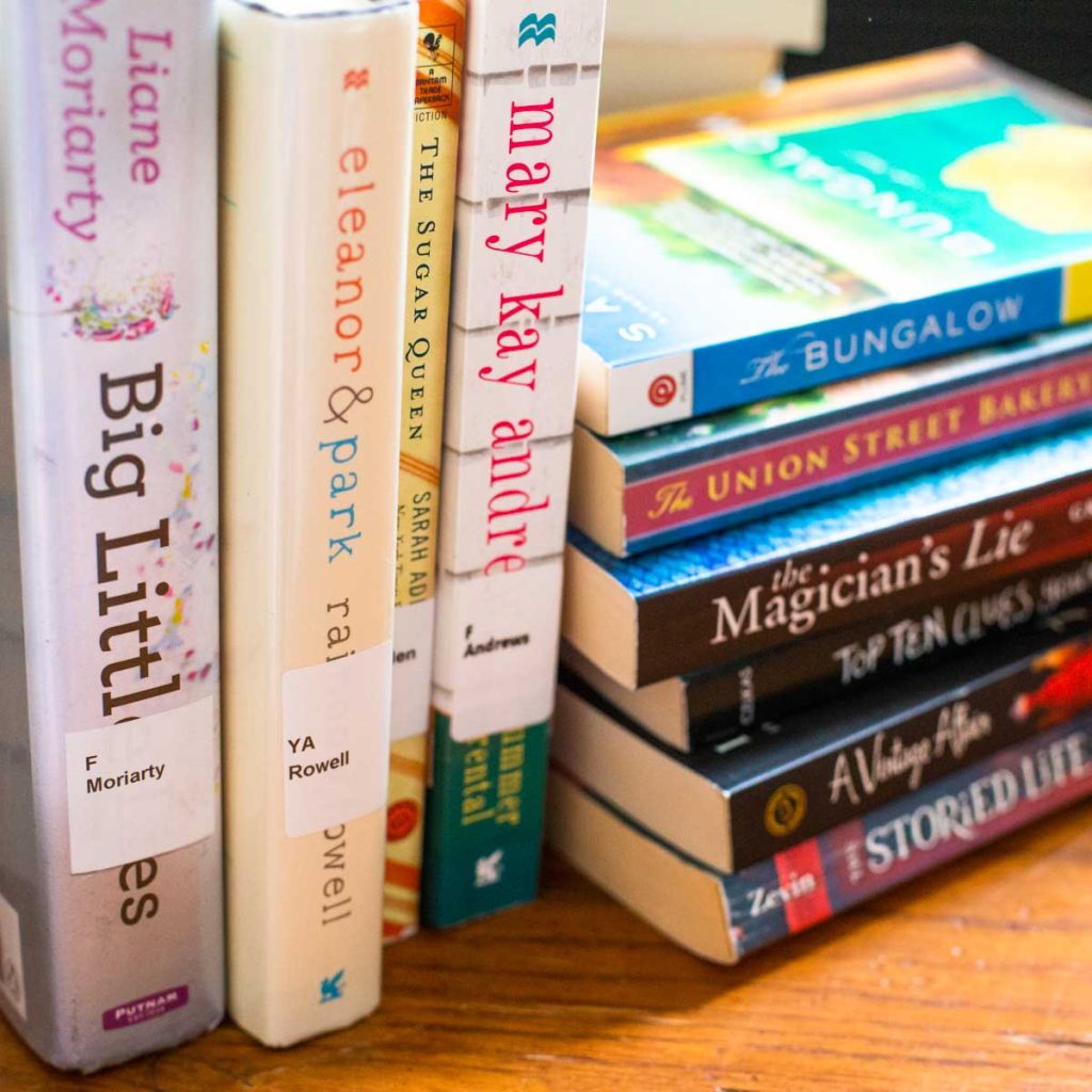 A stack of books from the library from the 2015 book list.