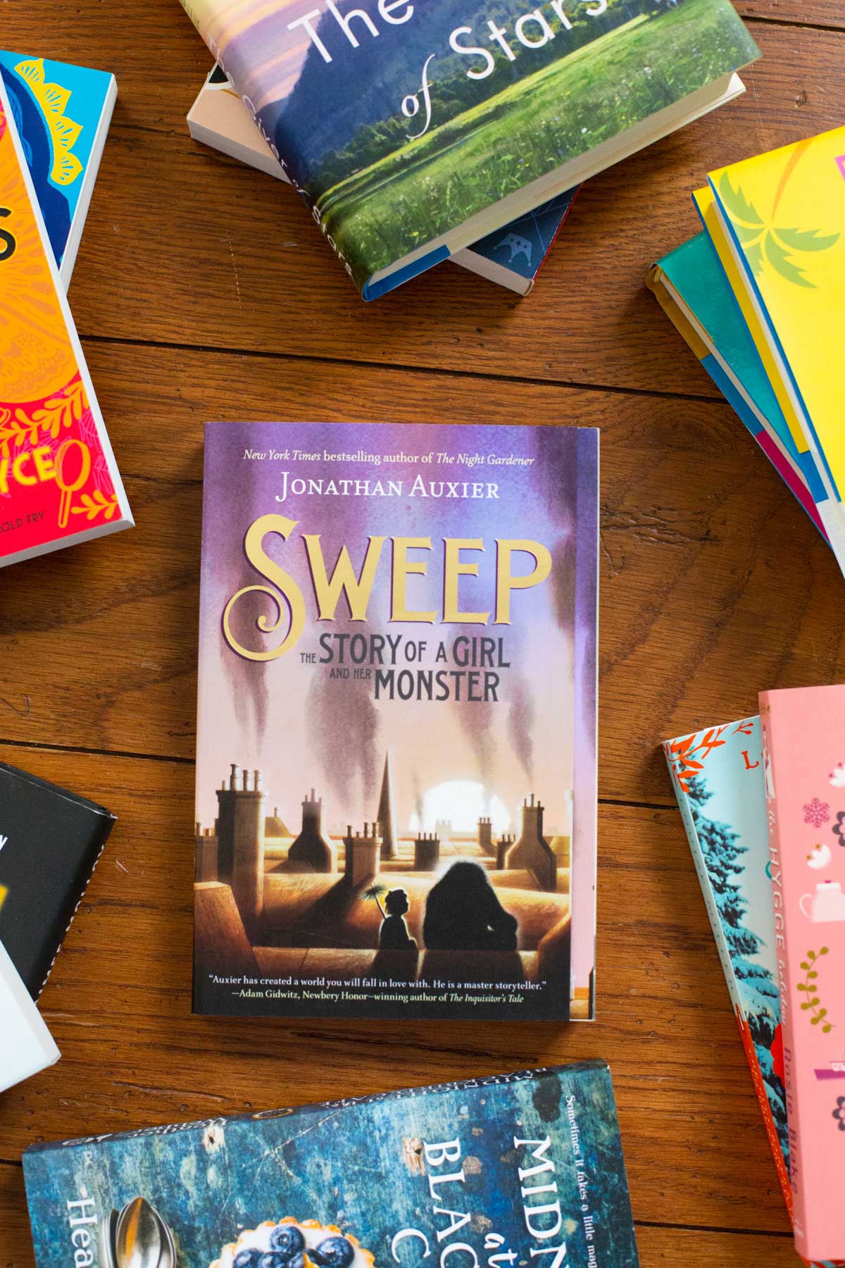 A copy of the book Sweep is on the table.