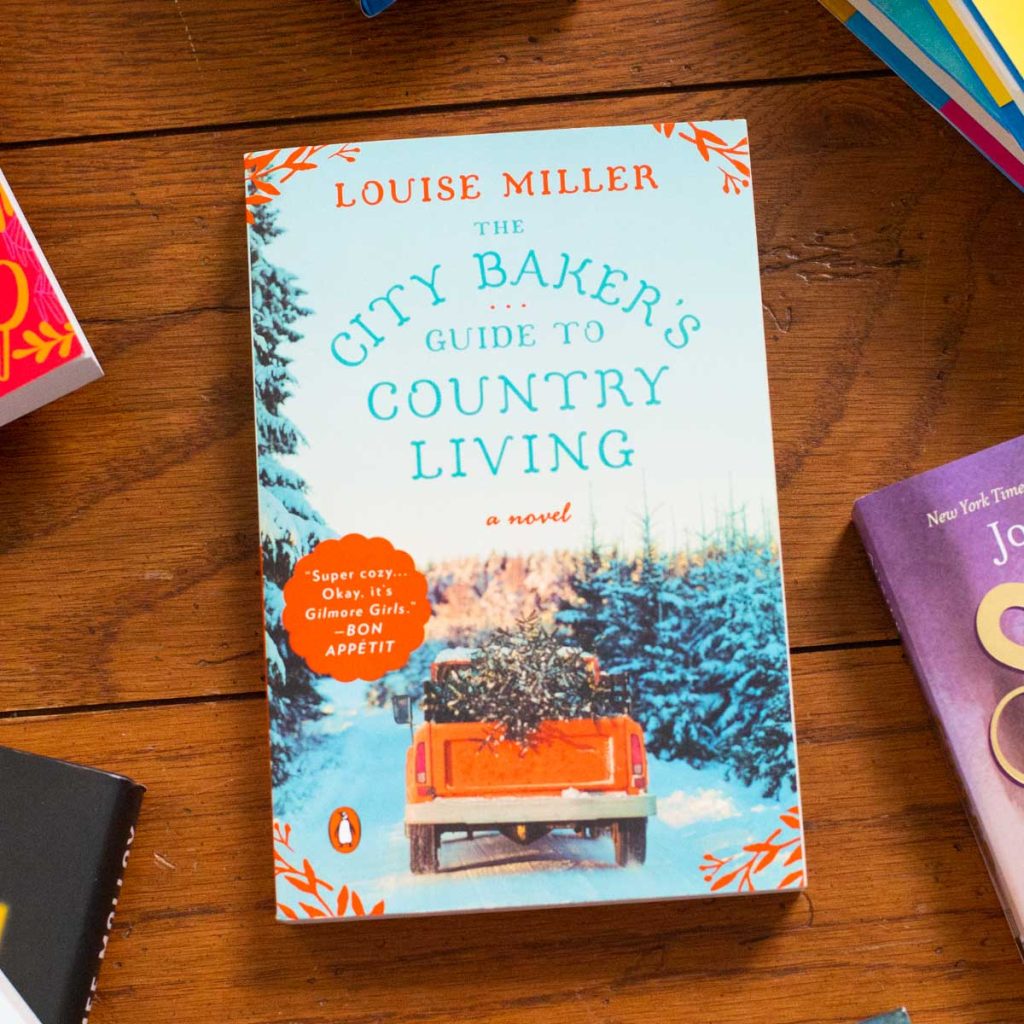 A copy of the book The City Baker's Guide to Country Living sits on the table.