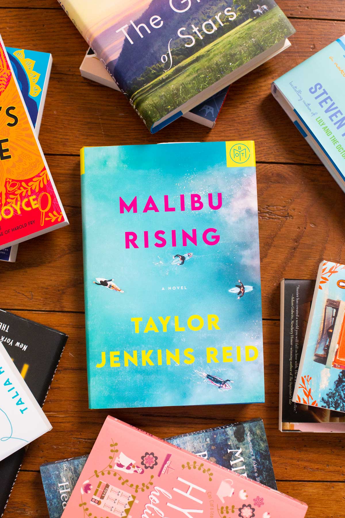 A copy of the book Malibu Rising is on the table.