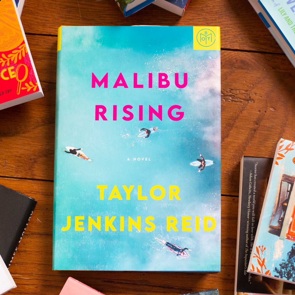 A copy of the book Malibu Rising is on the table.