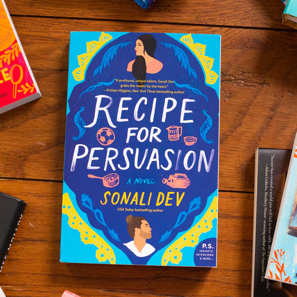A copy of the book Recipe for Persuasion is on the table.