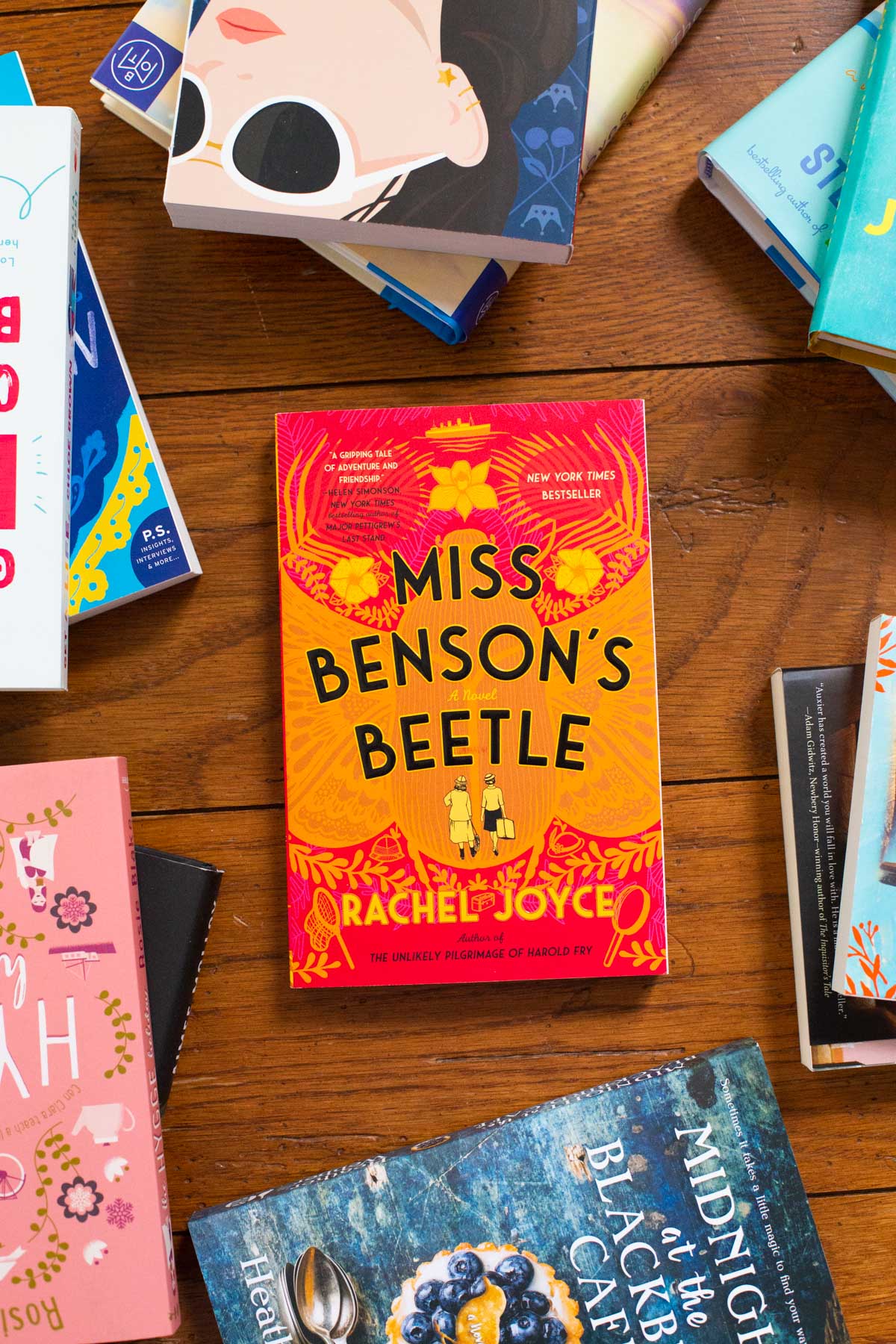 A copy of the book Miss Benson's Beetle is on the table.