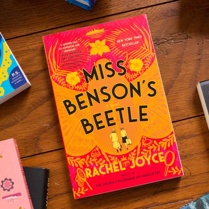 A copy of the book Miss Benson's Beetle is on the table.