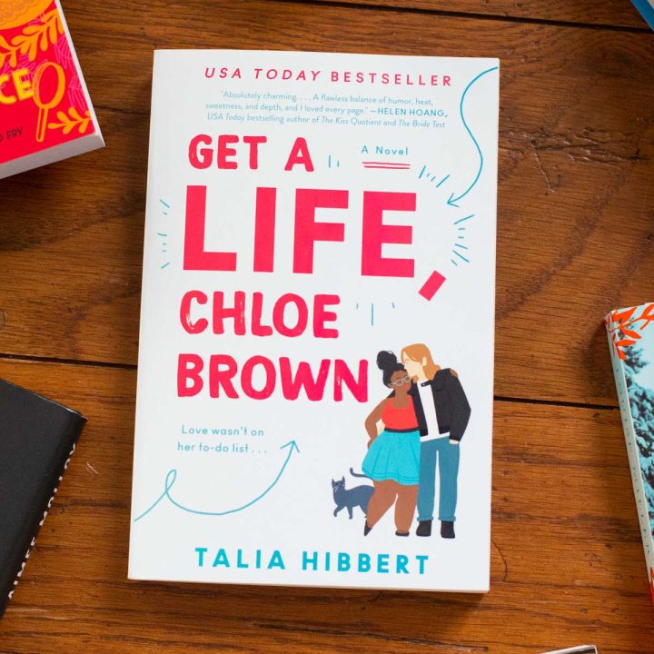 A copy of the book Get a Life Chloe Brown sits on a table.
