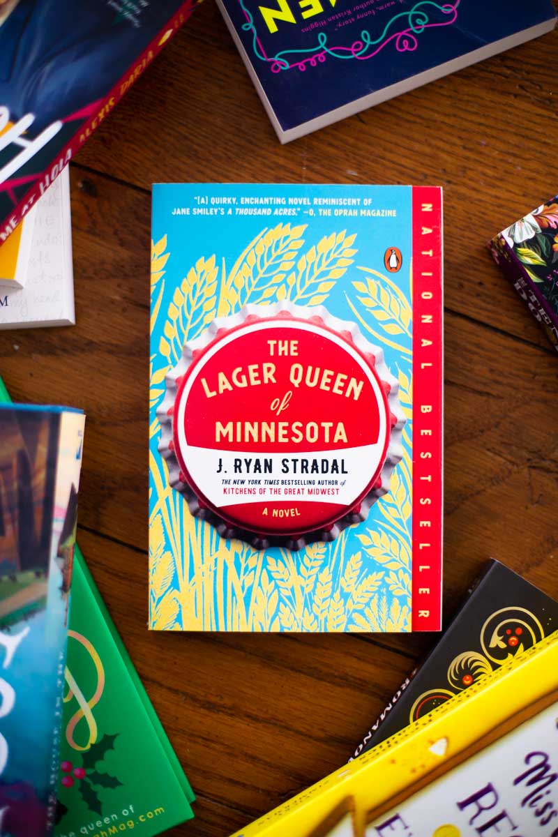 A copy of the book The Lager Queen of Minnesota is on the table.