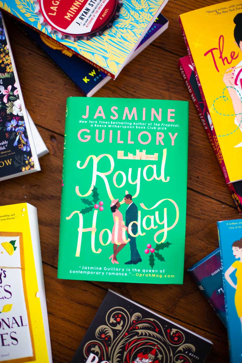 A copy of the book Royal Holiday is on the table.