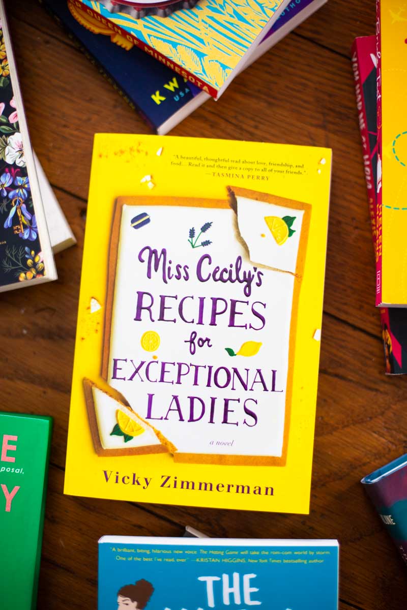 A copy of the book Miss Cecily's Recipes is on the table.