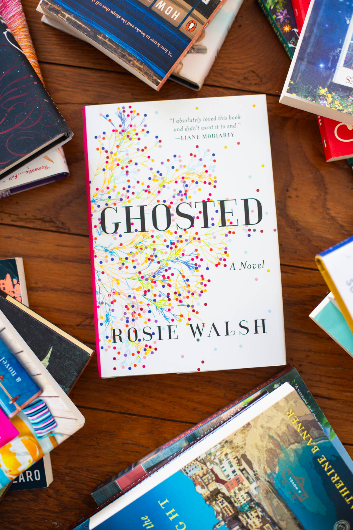 A copy of the book Ghosted is on the table.