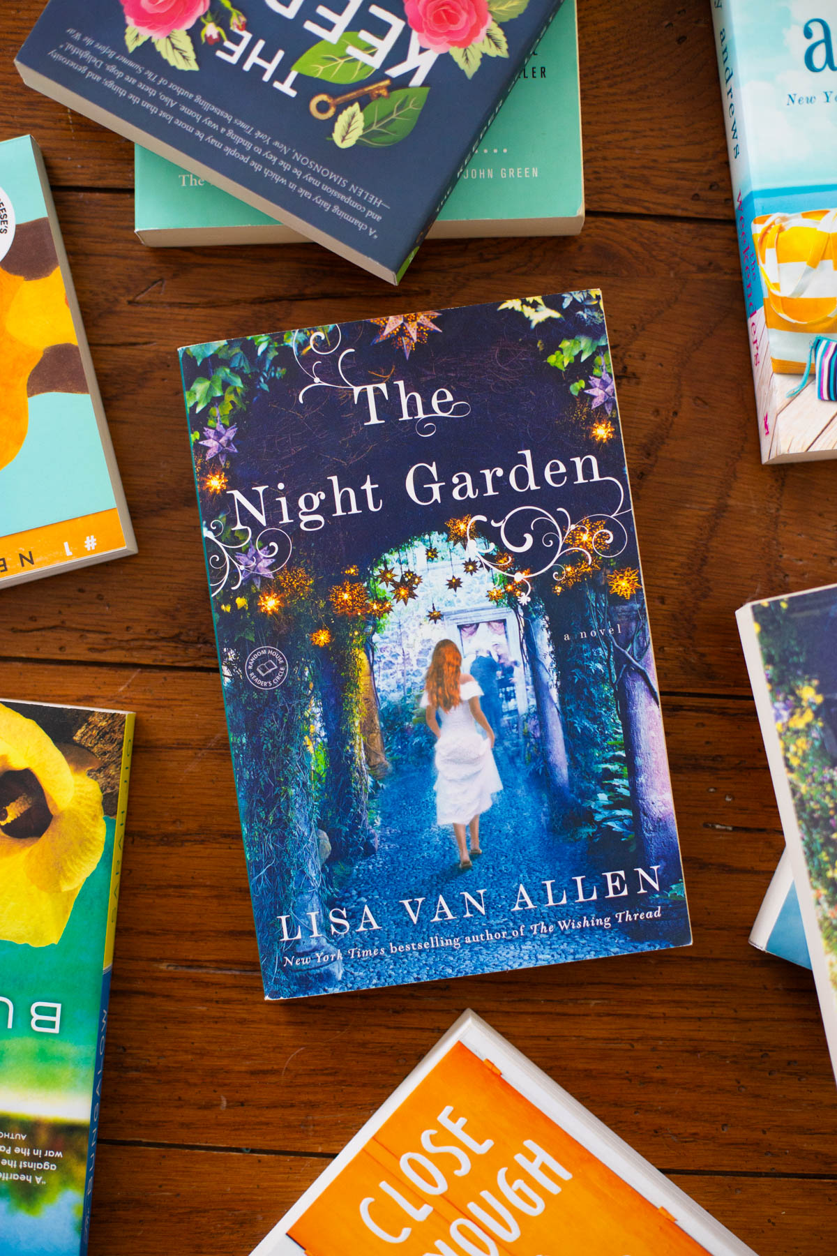 A copy of the book The Night Garden sits on a table.