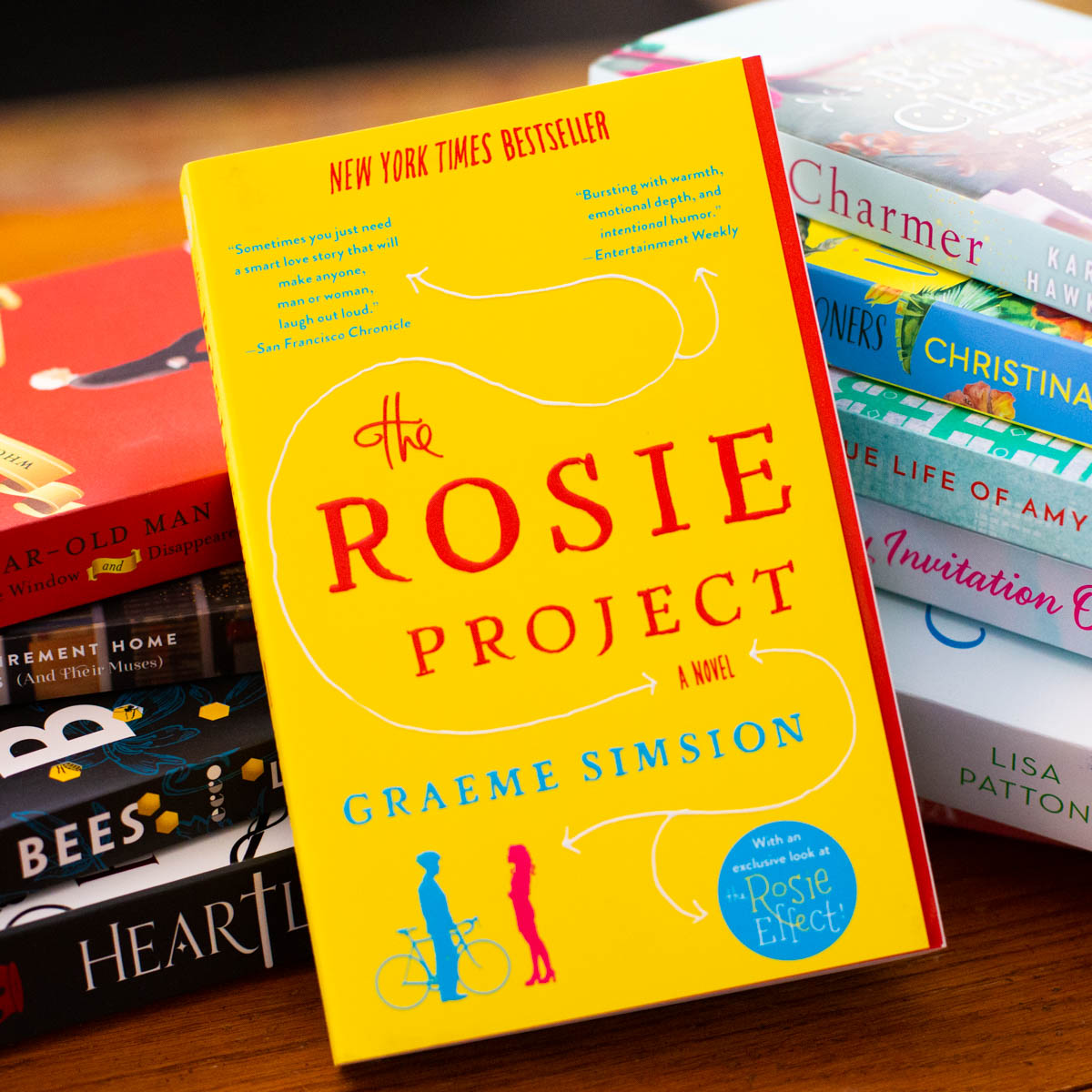 A copy of The Rosie Project is on the table.