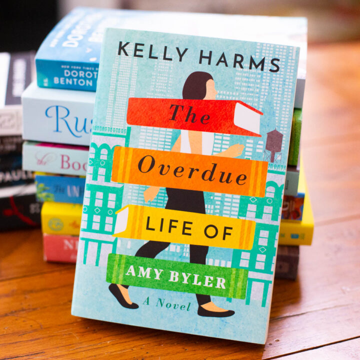 A copy of the book The Overdue Life of Amy Byler is on a table.