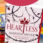 A copy of the book Heartless is on the table.