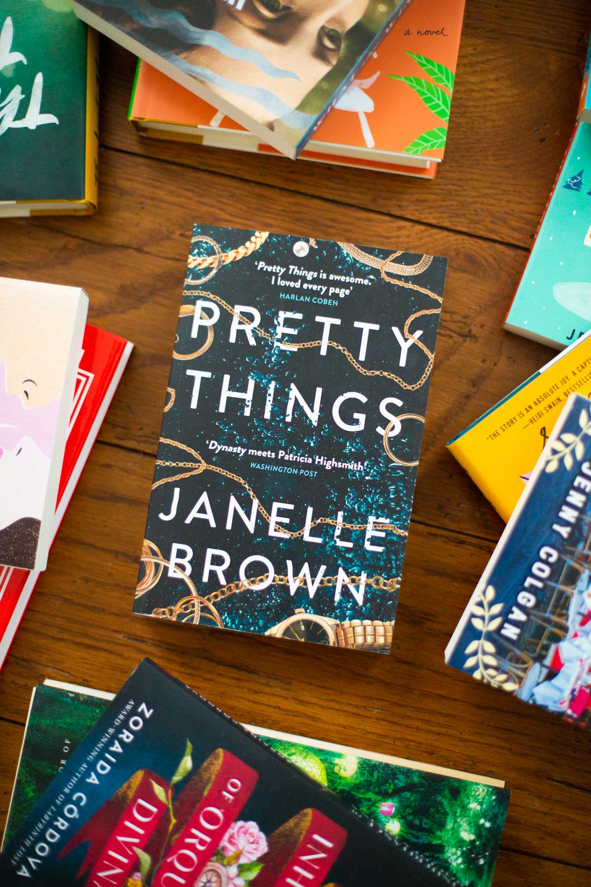 A copy of the book Pretty Things sits on a table.