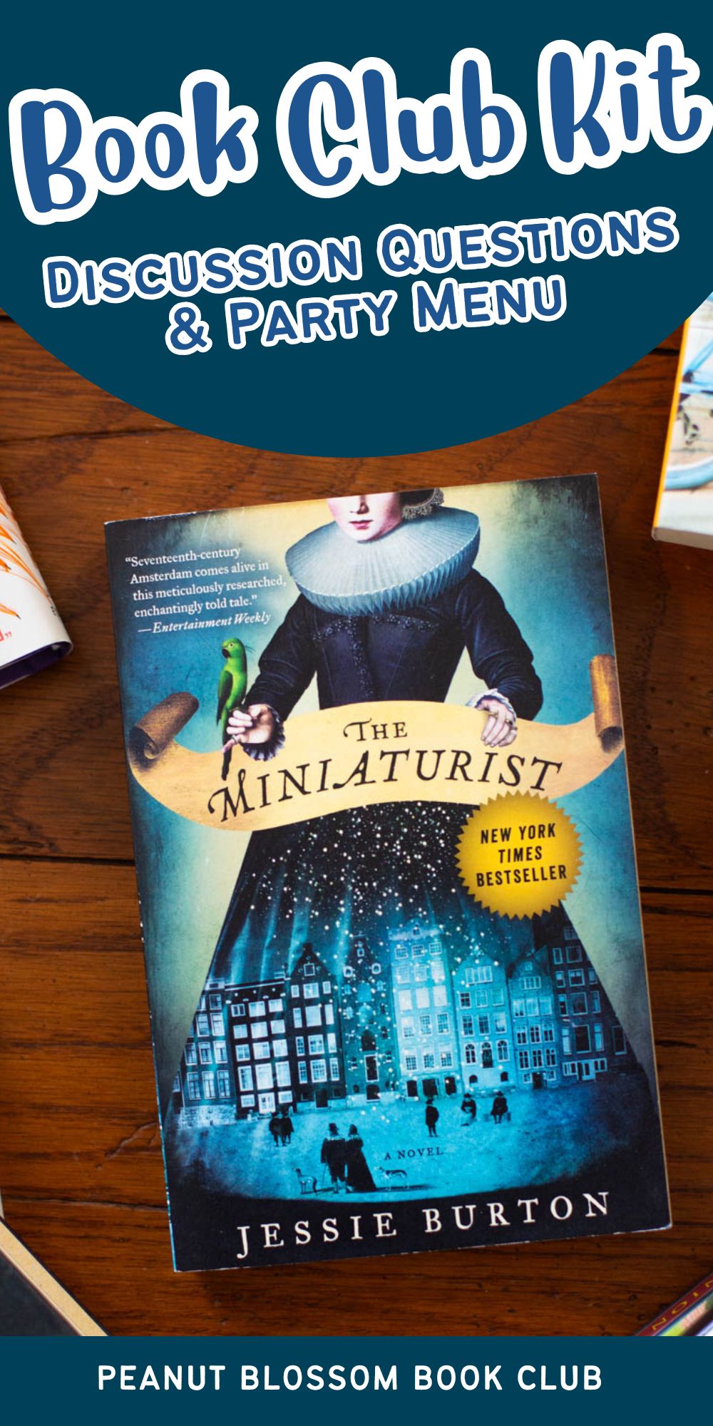 A copy of the book The Miniaturist is on the table.