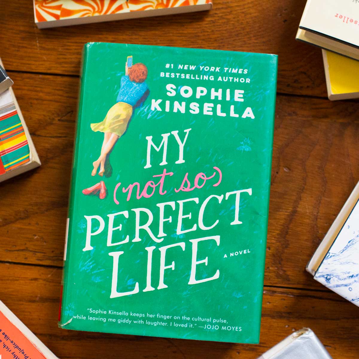 A copy of the book My Not So Perfect Life is on the table.