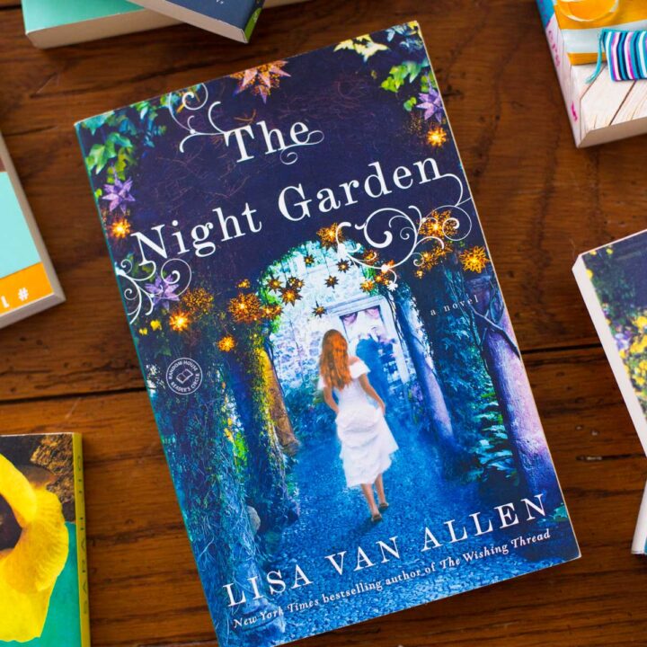 A copy of the book The Night Garden sits on a table.