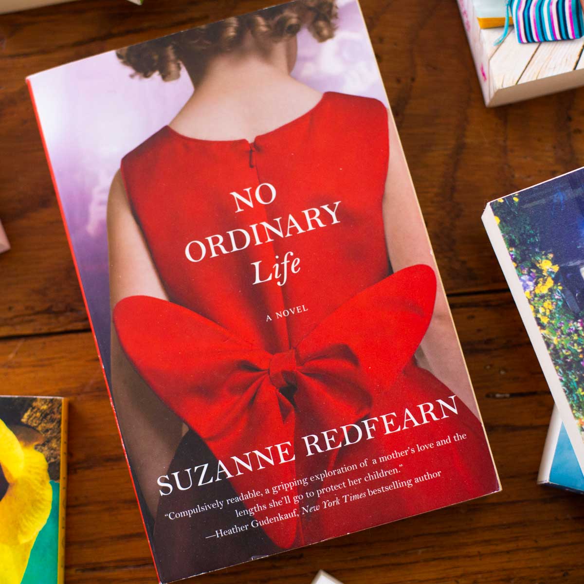 A copy of the book No Ordinary Life sits on a table.