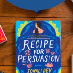 A copy of the book Recipe for Persuasion is on the table.