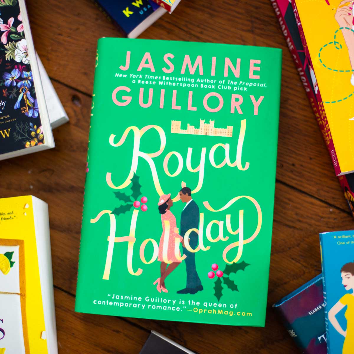 A copy of the book Royal Holiday is on the table.