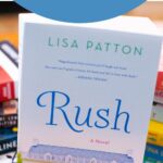 A copy of the book Rush is on the table.