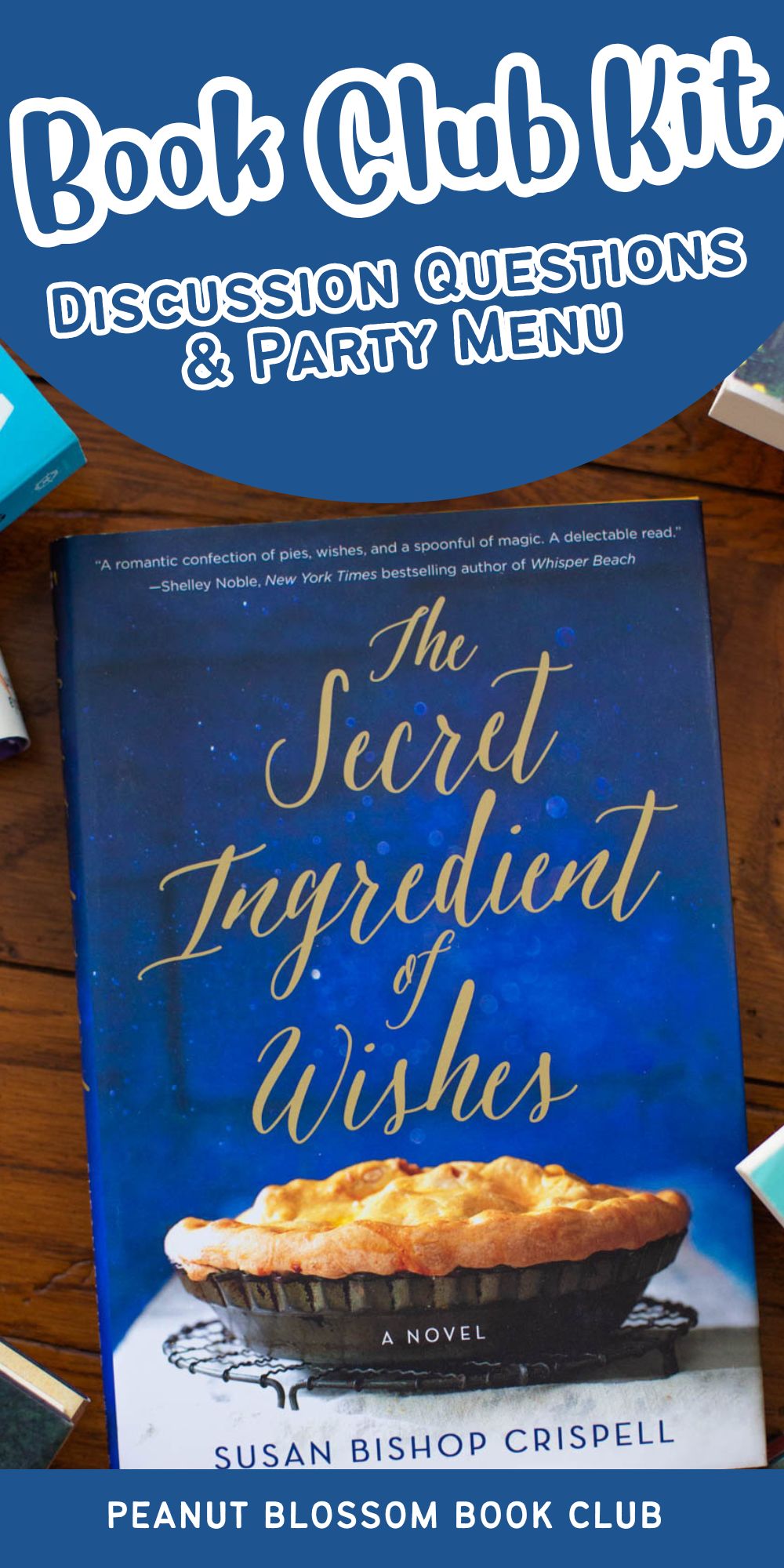A copy of the book The Secret Ingredient of Wishes sits on a table.