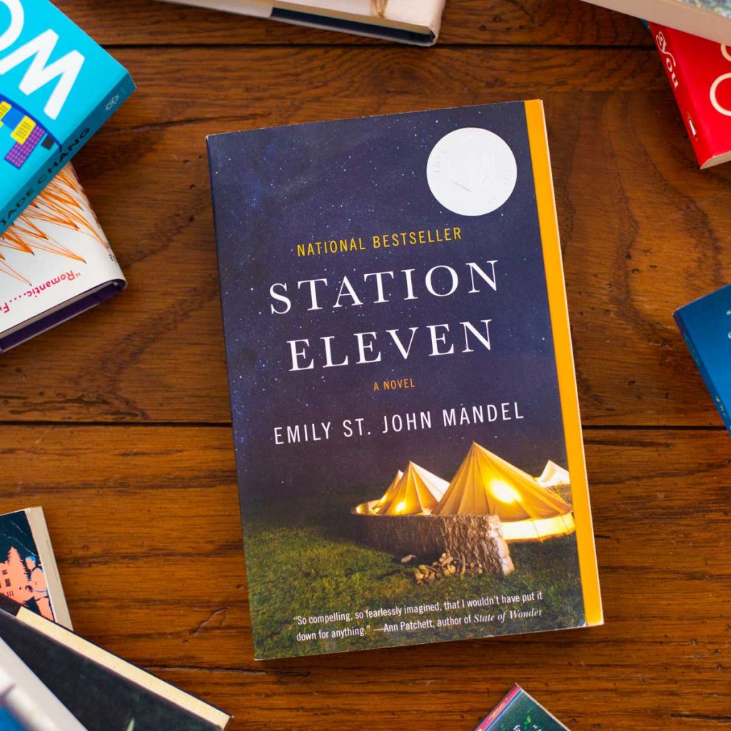 A copy of the book Station Eleven is on the table.