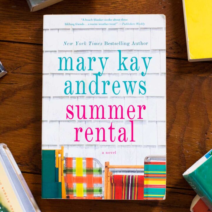 A copy of the book Summer Rental is on a table.