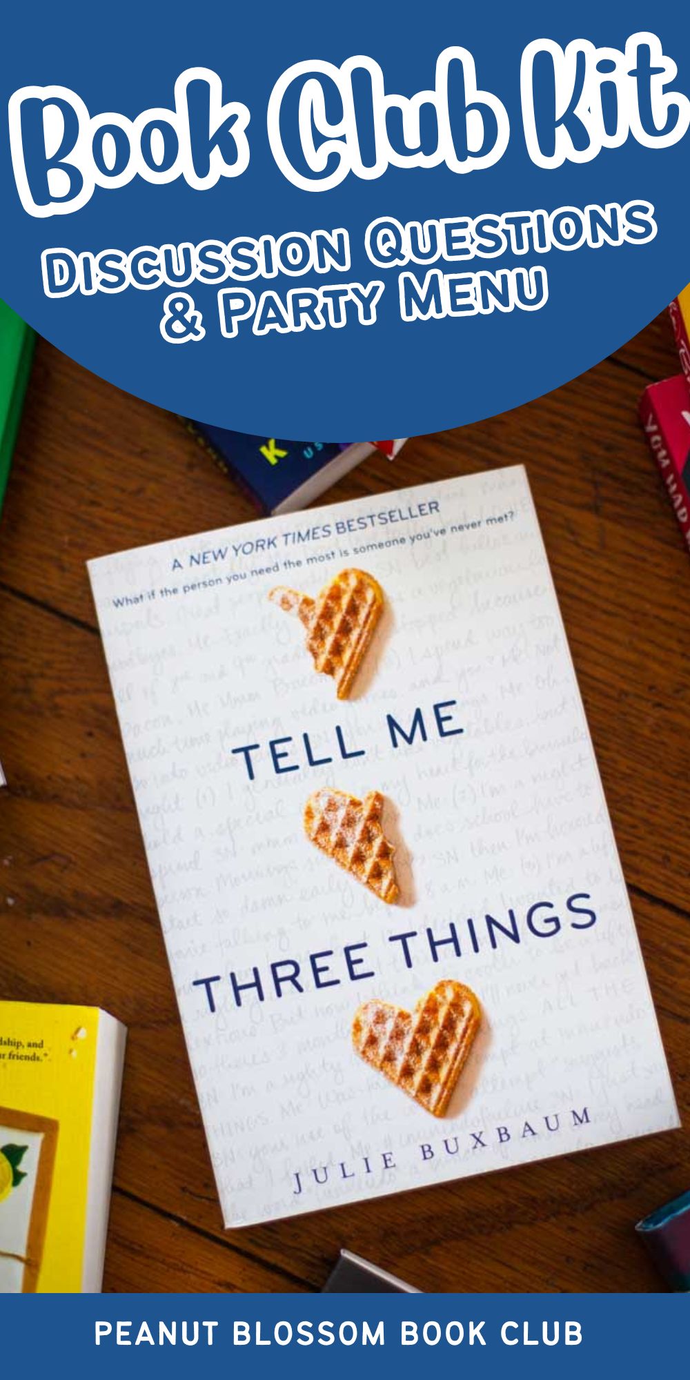 A copy of the book Tell Me Three Things is on the table.