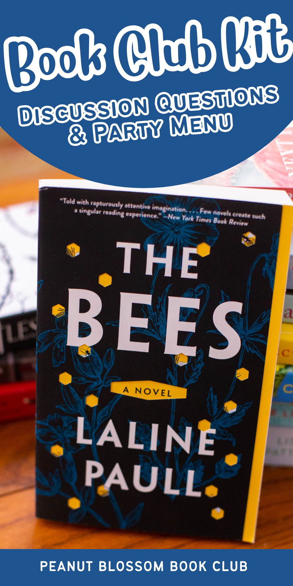 The copy of the book The Bees sits on a table.