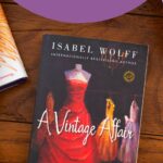 A copy of the book A Vintage Affair is on a table.