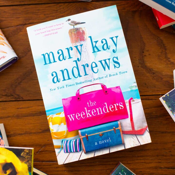 A copy of the book The Weekenders sits on a table.