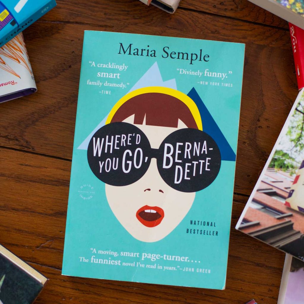 A copy of the book Where'd You Go Bernadette sits on a table.
