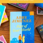 A copy of Part of Your World by Abby Jimenez is on the table.