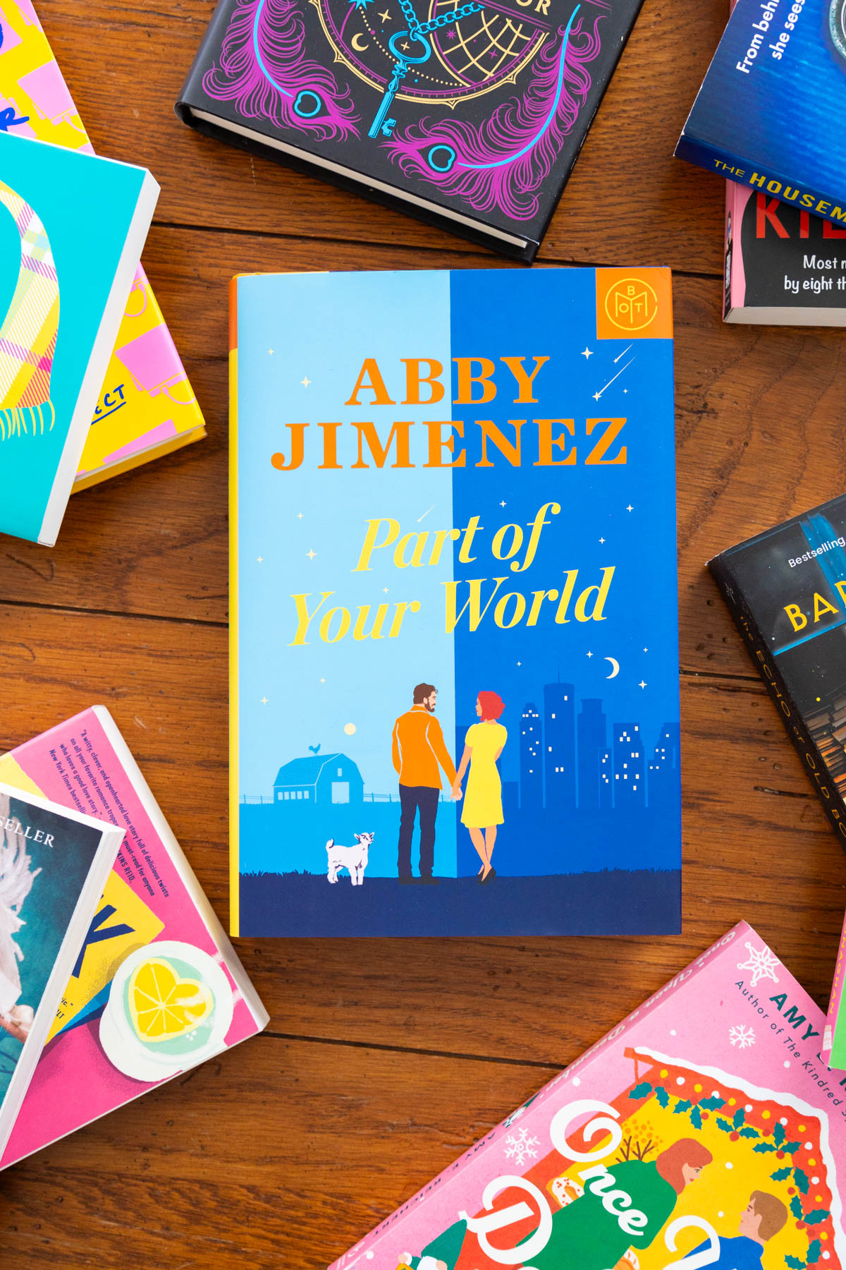 A copy of Part of Your World by Abby Jimenez is on the table.