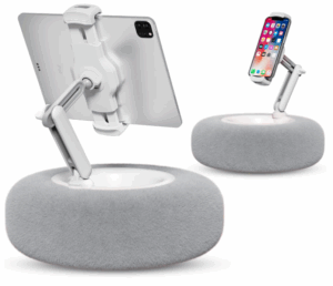The pillow base has an arm that holds a kindle on top.