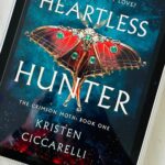 The book cover for Heartless Hunter by Kristen Ciccarelli is on the screen of an iPad.