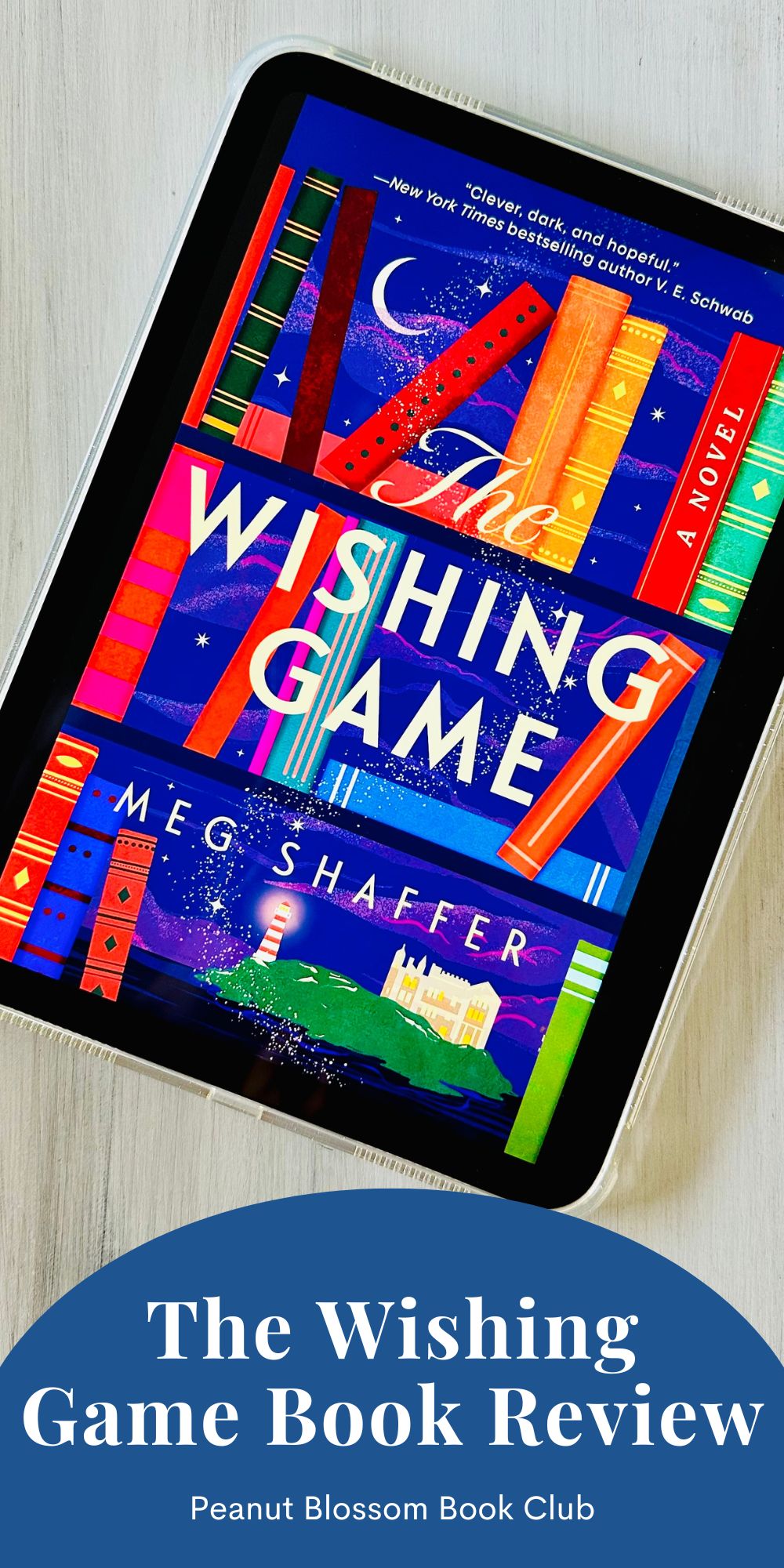 The cover of the book The Wishing Game by Meg Shaffer is on the screen of an iPad.