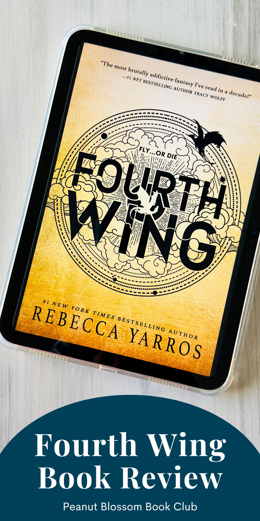 A copy of the book Fourth Wing by Rebecca Yarros is on the screen of an iPad.