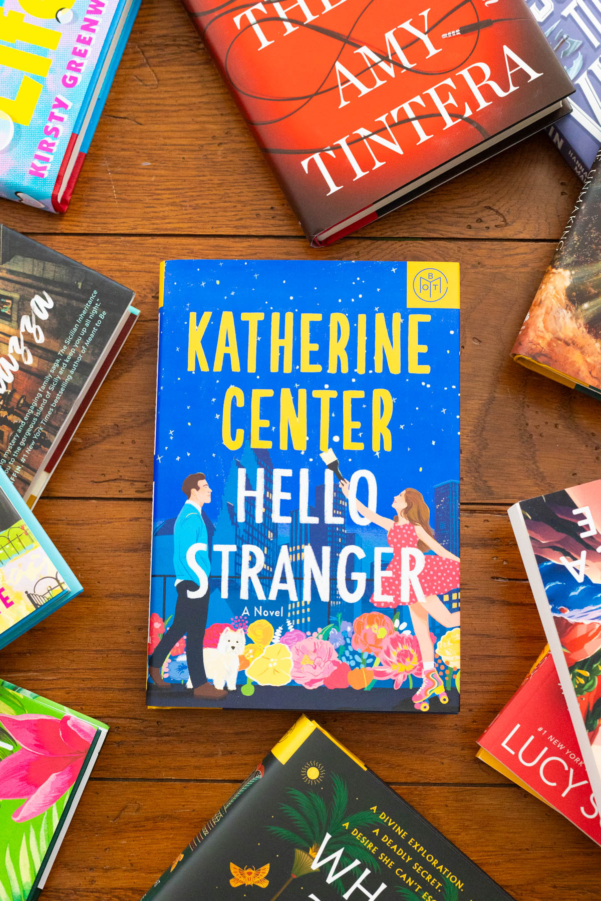 A copy of the book Hello Stranger by Katherine Center sits on the table.