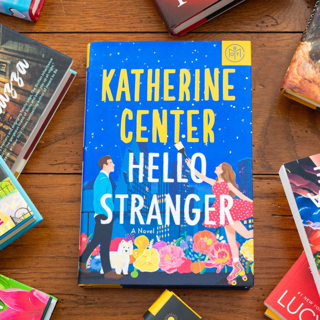 A copy of the book Hello Stranger by Katherine Center sits on the table.