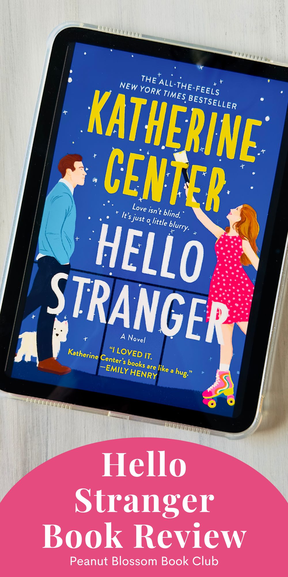 A copy of the book Hello Stranger by Katherine Center is on the screen of an ipad.