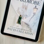 The cover of the book Once Upon a Wardrobe by Patti Callahan is on the screen of an iPad.