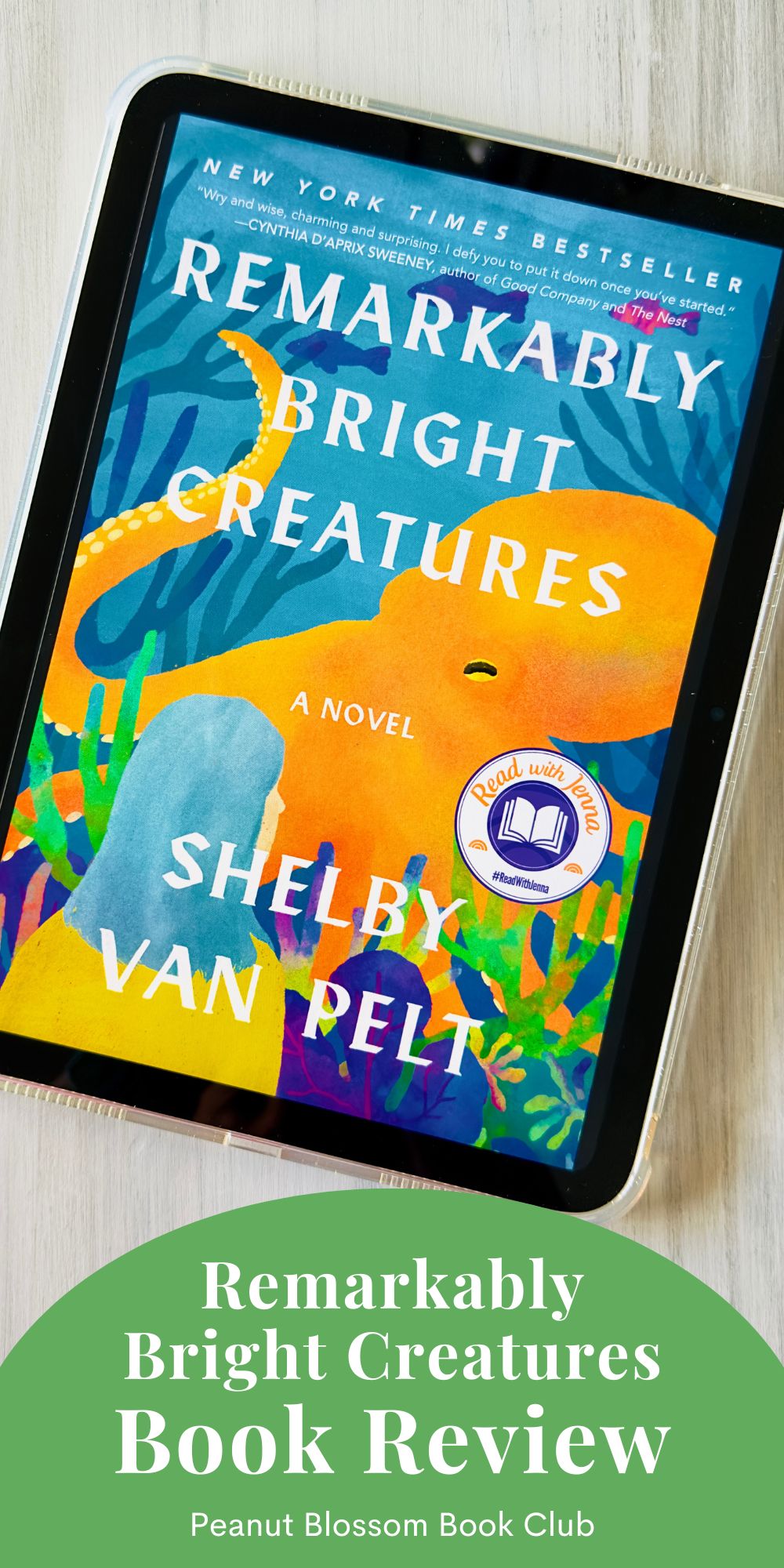 A cover of the book Remarkably Bright Creatures by Shelby Van Pelt is on the screen of an iPad.
