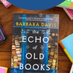 A copy of The Echo of Old Books is on the table.