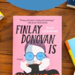 The book Finlay Donovan is Killing It is on the table.