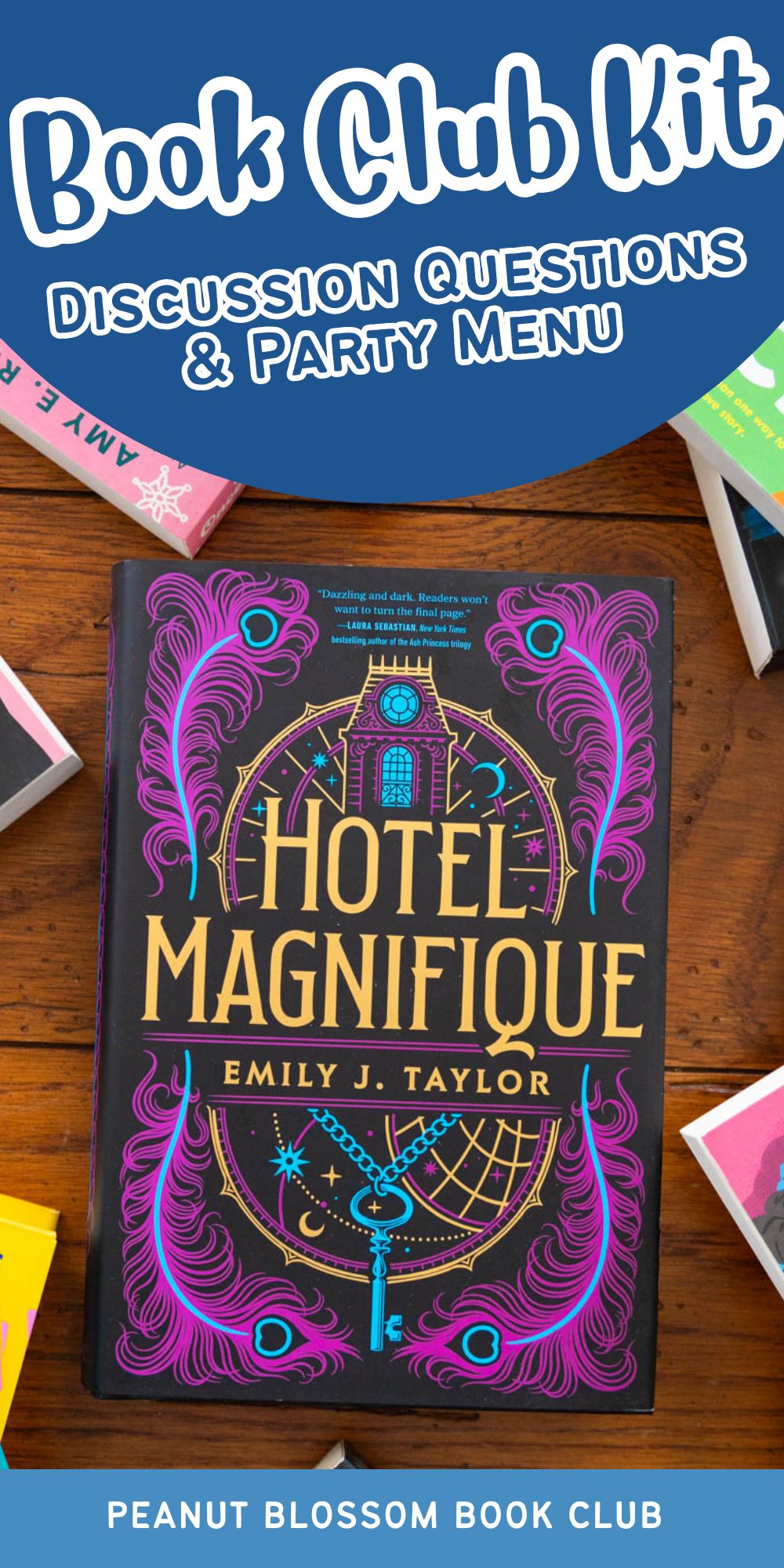 A copy of the book Hotel Magnifique is on the table.