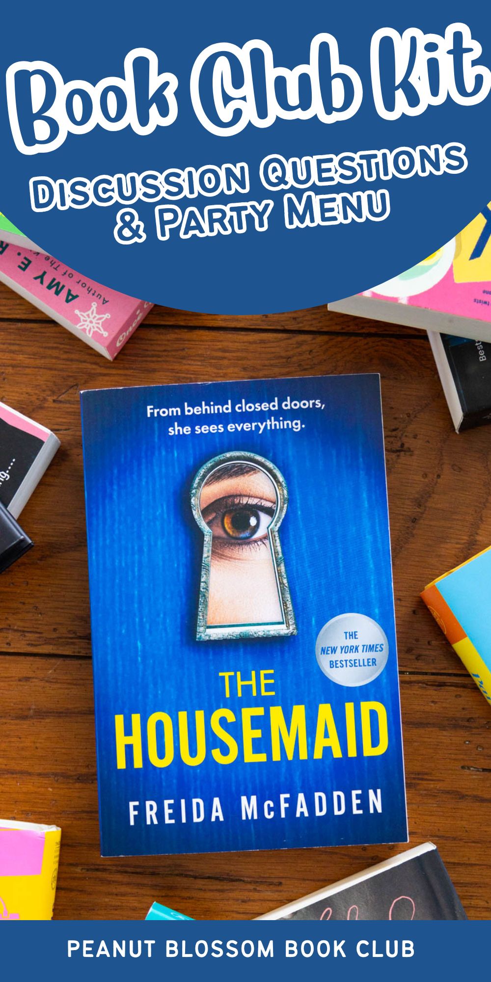 A copy of the book The Housemaid by Freida McFadden is on the table.