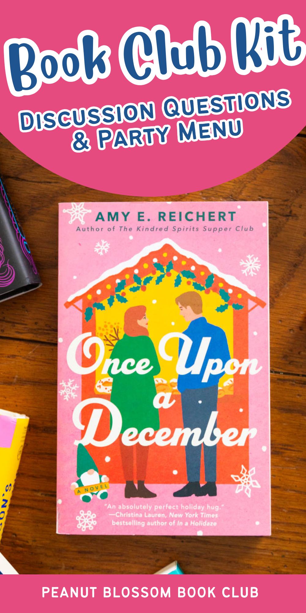 A copy of Once Upon a December by Amy E. Reichert sits on the table.