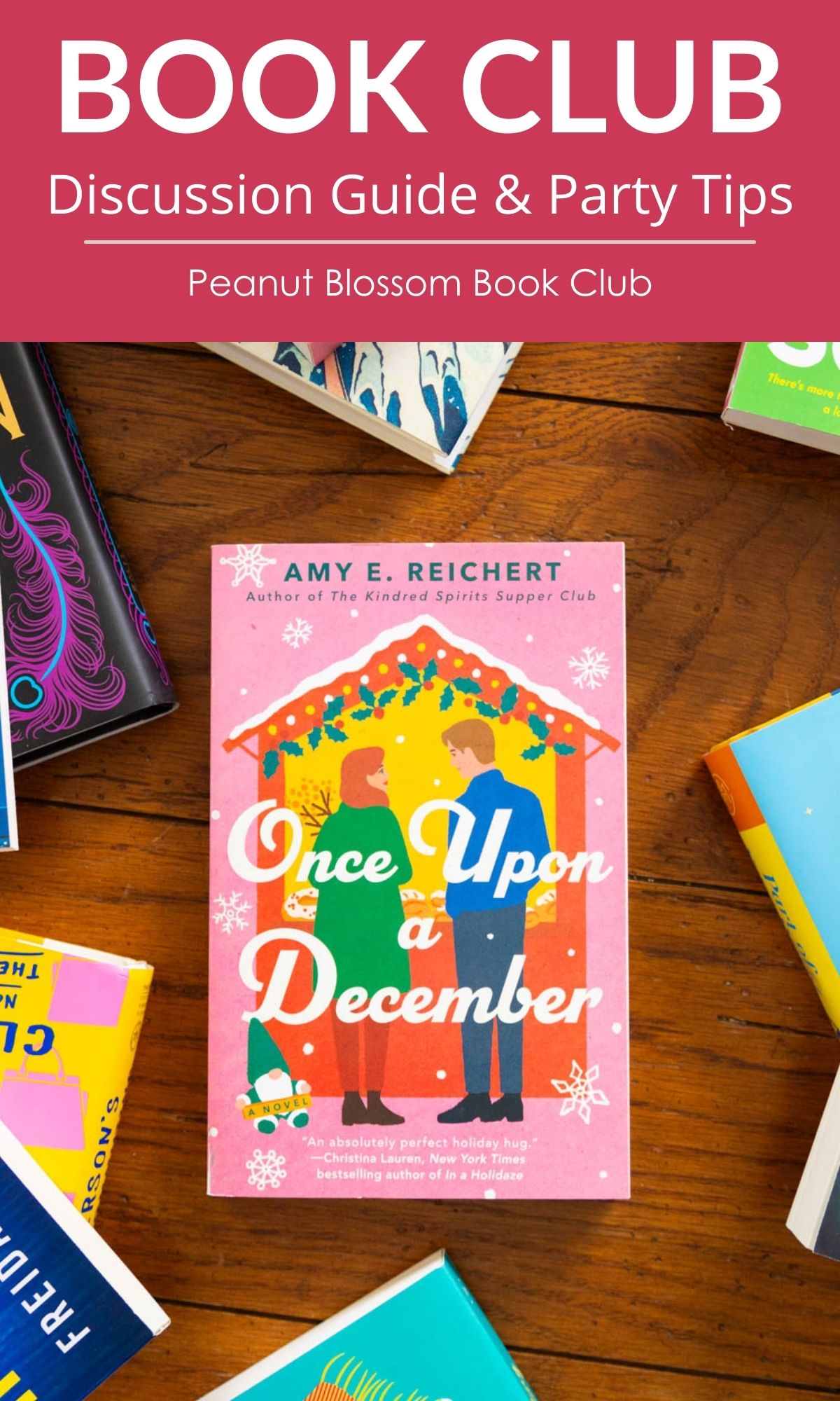 A copy of Once Upon a December by Amy E. Reichert sits on the table.